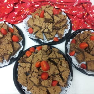 A dessert platter of brownies, bars and cookies.