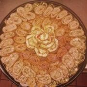 A tray of sliced wrap pinwheels.